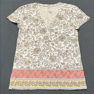 So cute, V neck, white with peach, yellow, green. Thin fabric.